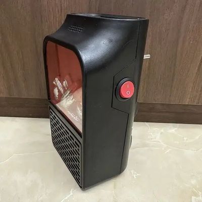 휴대용 빠른 난방 900W 개인 조절 플러그 인 호텔 방을위한 미니 히터 온도